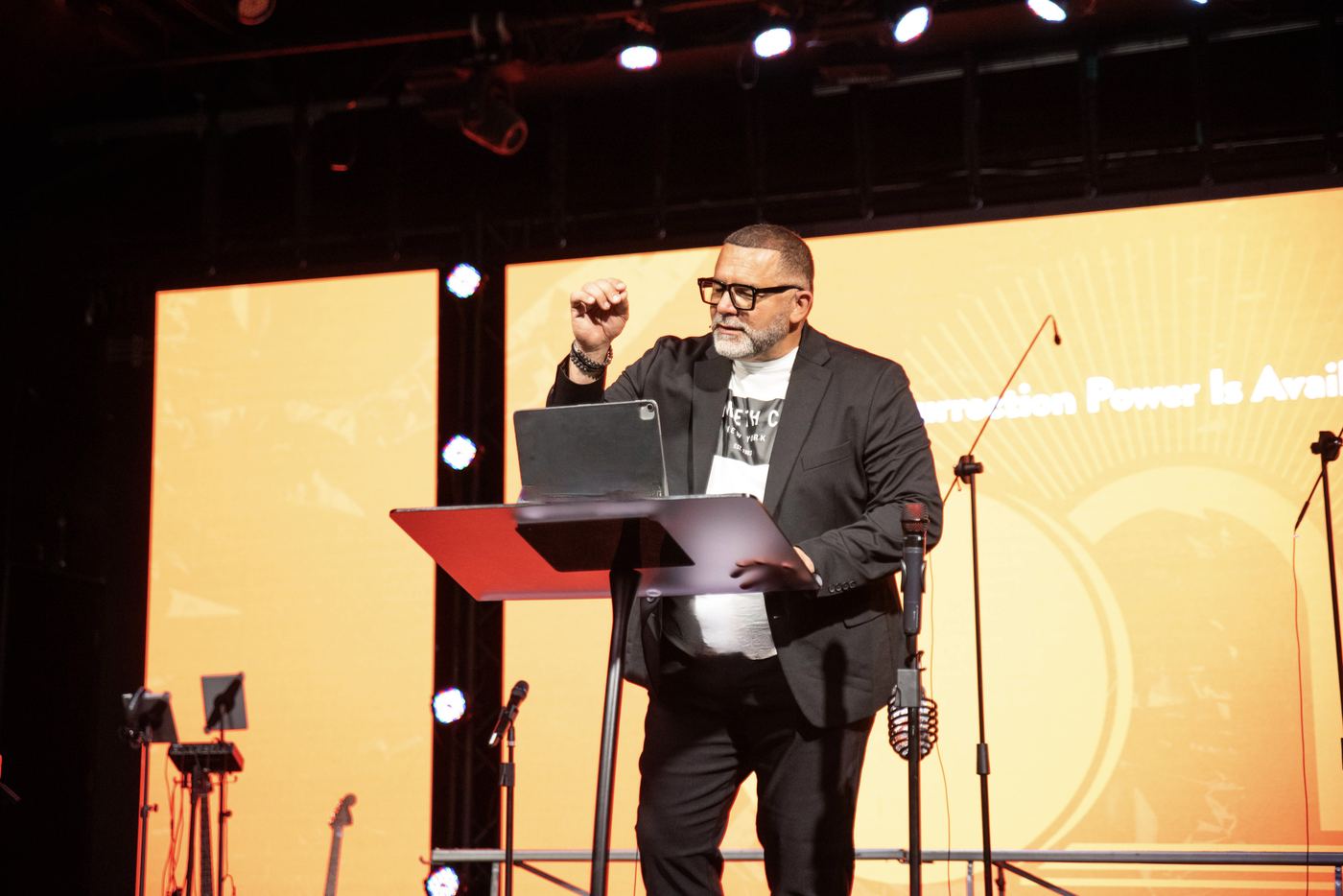 Manny Rivera preaching at a conference